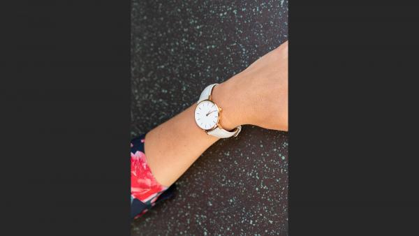 Close view on woman's hand watch