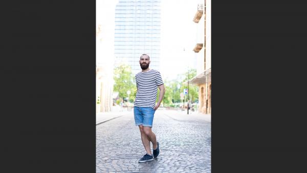 Man standing in city environment 