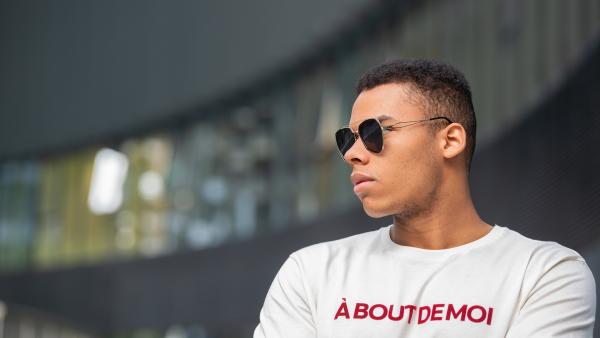 Close up on black man face in sunglass