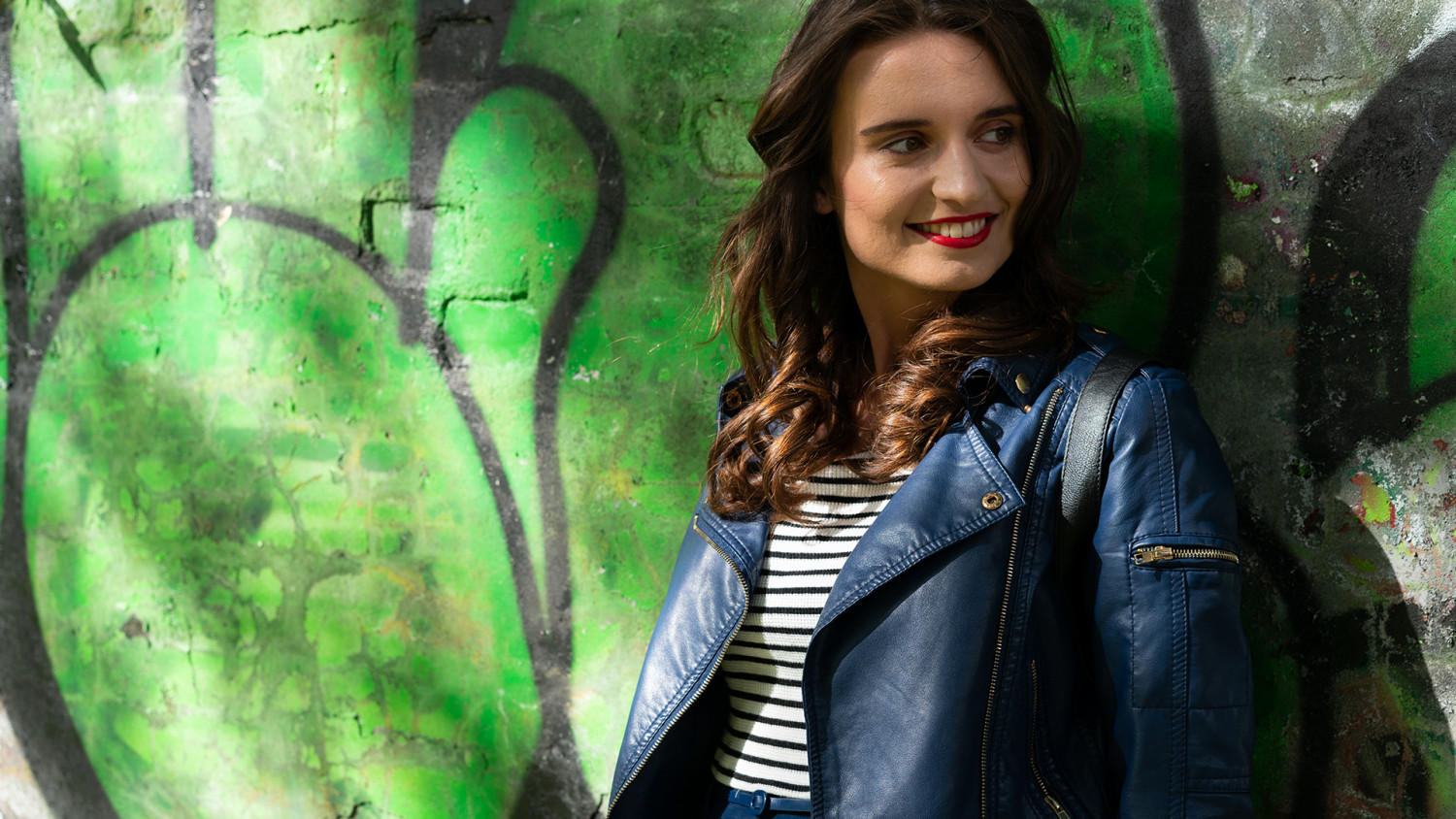 Young Lady Next To Graffiti Photo